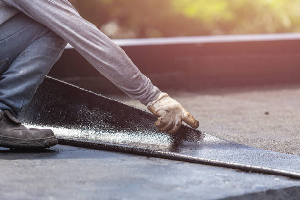 Professional Basement Waterproofing technician working in Duluth, MN